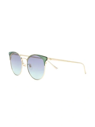 Shop Gucci Oversized Cat Eye Sunglasses In Gold