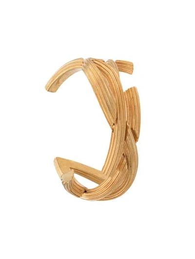 Shop Saint Laurent Monogram Textured Cuff Bracelet In Gold