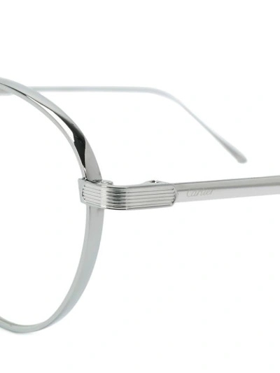 Shop Cartier C De  Glasses In Metallic