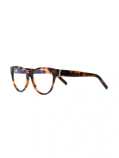 Shop Saint Laurent Oval Shaped Glasses In Brown