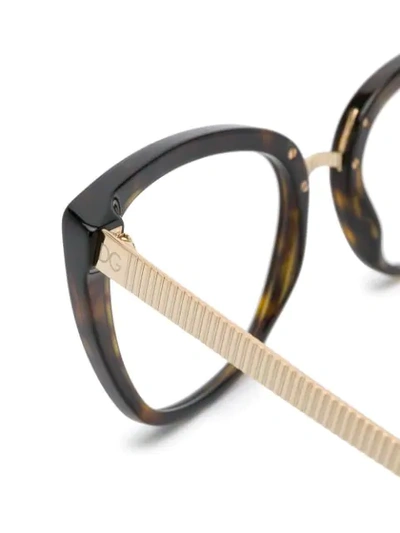 Shop Dolce & Gabbana Cat-eye Shapes Glasses In Brown