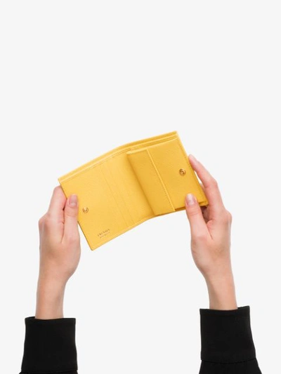 Shop Prada Small Saffiano Leather Wallet In Yellow