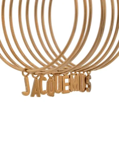 Shop Jacquemus Logo Hoop Earrings In Oro
