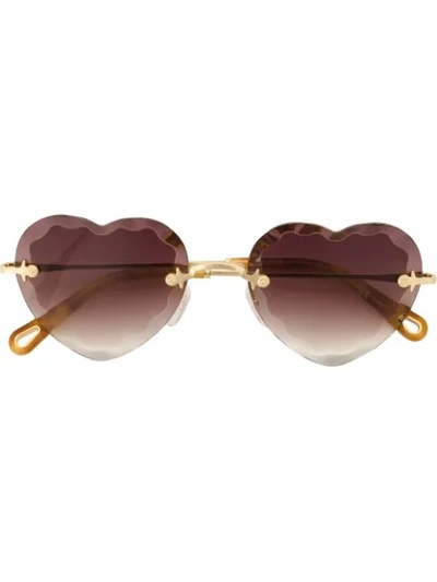 Shop Chloé Heart-shape Sunglasses In Gold