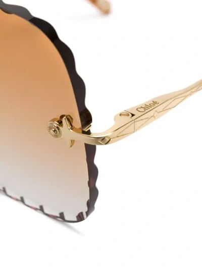 Shop Chloé Rosie Sunglasses In Gold