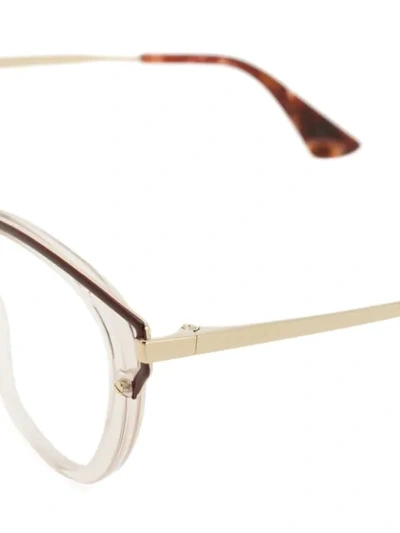 Shop Prada Eyewear Cat Eye-frame Glasses - White