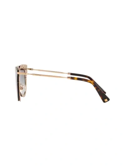 Shop Valentino Garavani Cat Eye Sunglasses In Gold
