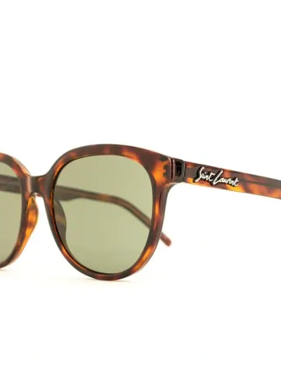 Shop Saint Laurent Round Frames Sunglasses In Brown