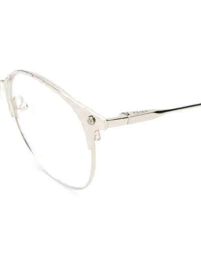 Shop Chloé Round Frame Glasses In Metallic