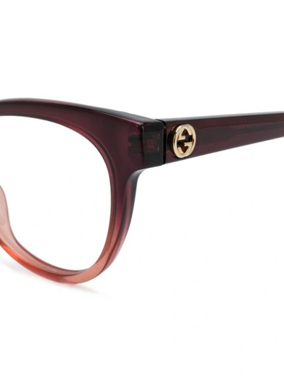 Shop Gucci Contrast Cat-eye Glasses In Red