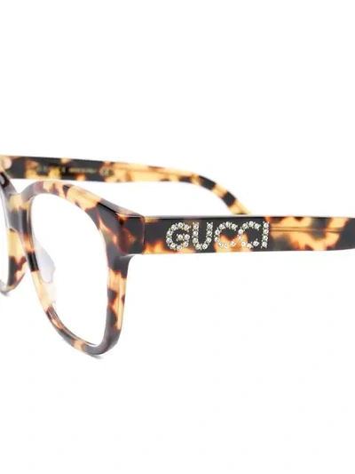 Shop Gucci Rectangle Frame Glasses In 棕色