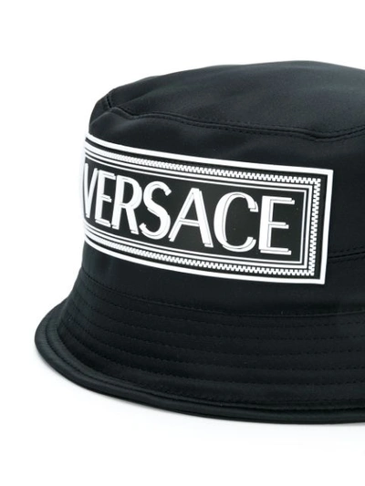 Shop Versace 90s Logo Bucket Hat In Black