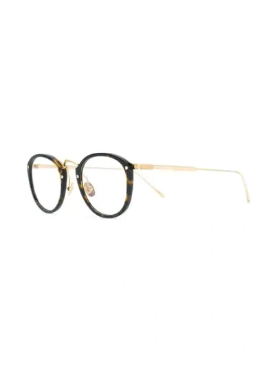 Shop Cartier Round Frame Glasses In Brown