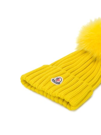 Shop Moncler Fur Pompom Beanie In 110 Yellow
