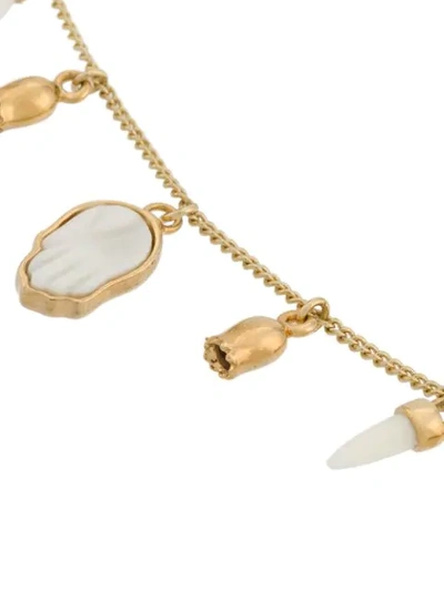 Shop Isabel Marant Buffalo Bone Charm Bracelet In Gold