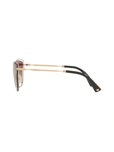 Shop Valentino Cat Eye Sunglasses In Gold