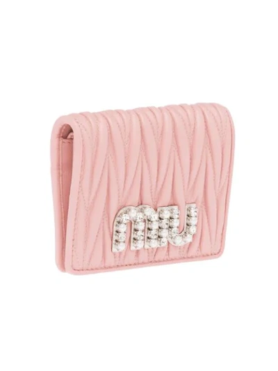 Shop Miu Miu Matelassé Embellished Billfold Wallet In Pink