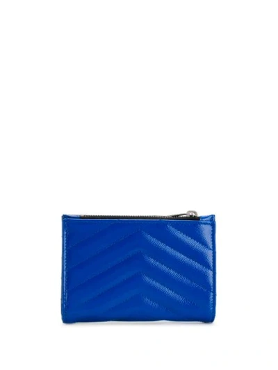 Shop Saint Laurent Monogram Plaque Purse In Blue