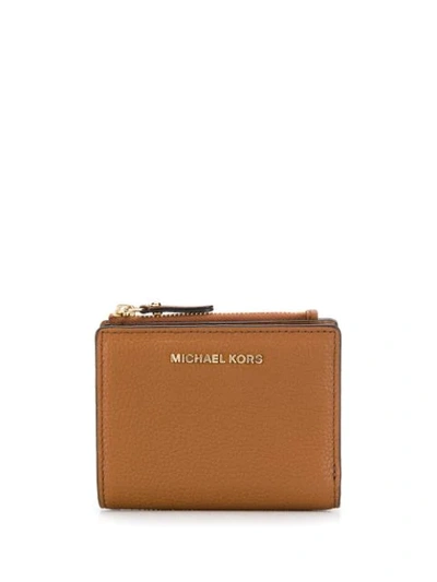 Shop Michael Michael Kors Compact Logo Wallet In Brown