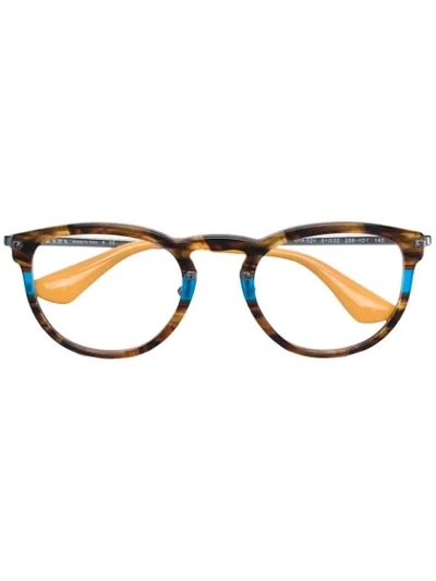 Shop Prada Round Frame Glasses In Brown