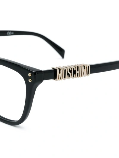 Shop Moschino Eyewear Cat-eye Shaped Glasses - Black