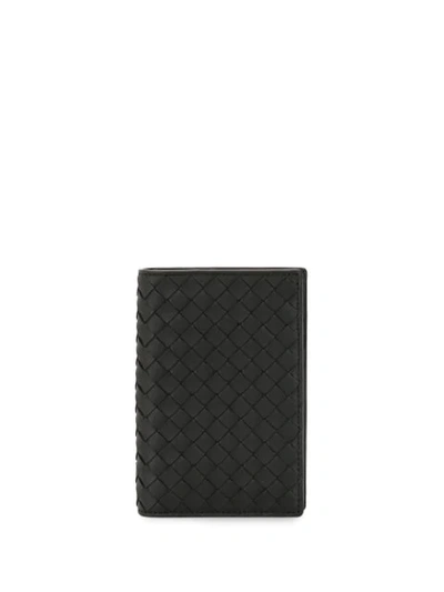 Shop Bottega Veneta Intrecciato Weave Passport Cover In Black