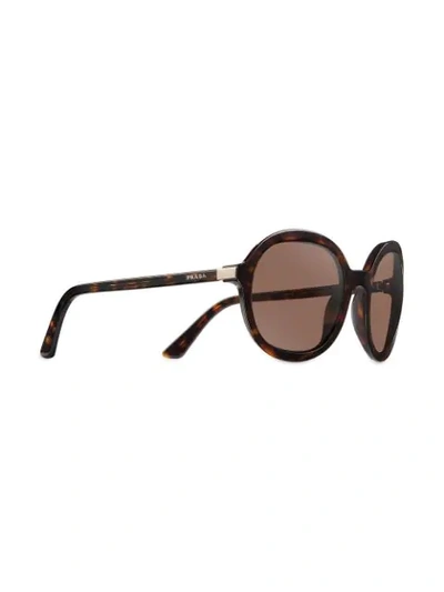 Shop Prada Round Frame Sunglasses In F08c1 Sienna