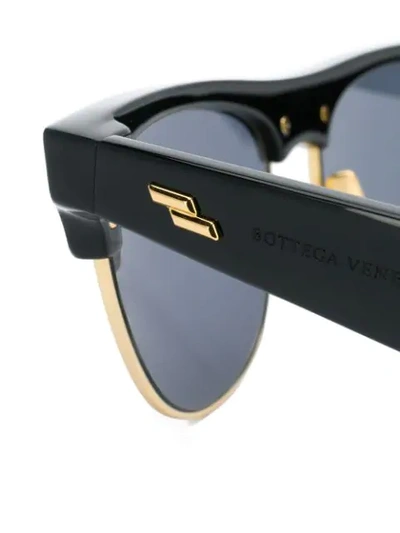 Shop Bottega Veneta Round Frame Sunglasses In Black