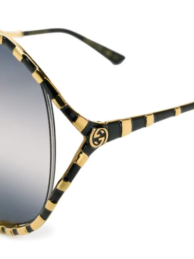 Shop Gucci Oversized Frame Sunglasses In 金色