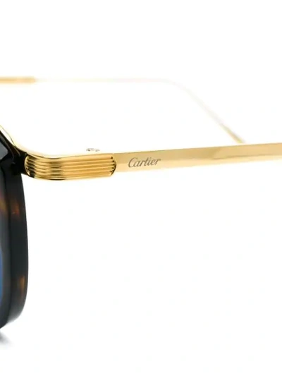 Shop Cartier Round Sunglasses