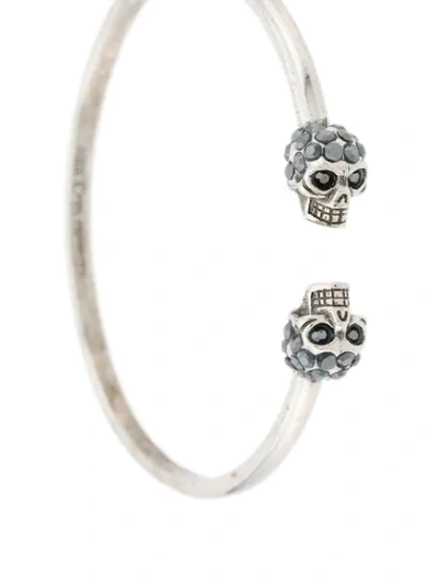 Shop Alexander Mcqueen Skull Earrings In Silver