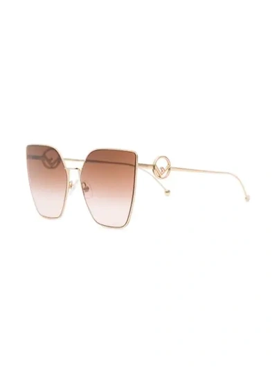 Shop Fendi Eyewear Gold Tone Oversized Square Logo Arm Sunglasses - Pink