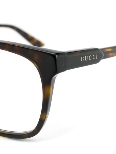 Shop Gucci Tortoiseshell Rectangular-frame Glasses In Brown