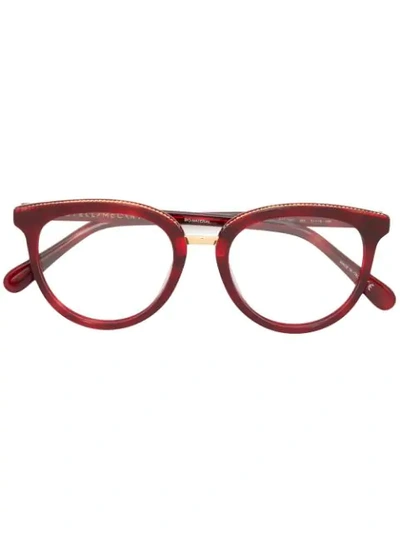 Shop Stella Mccartney Round Framed Glasses In Red