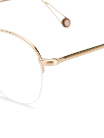 Shop Ahlem Voltaire Glasses In 金色