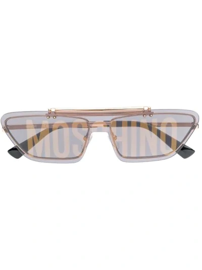 Shop Moschino Eyewear Logo Print Cat Eye Sunglasses In Gold