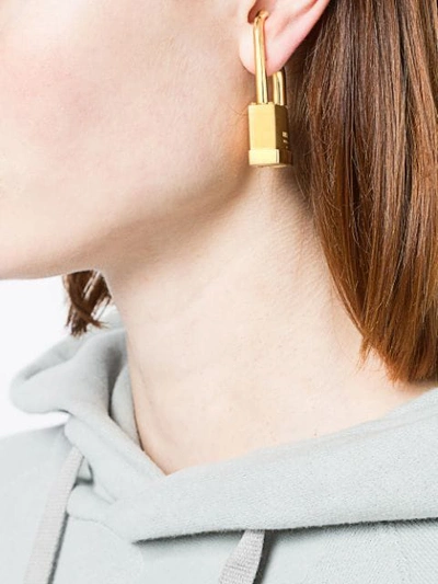 Shop Ambush Padlock Earring In Metallic
