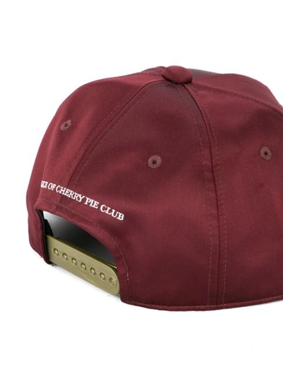 Shop Undercover Embroidered Logo Baseball Cap In Red