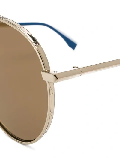 Shop Fendi Aviator Tinted Sunglasses In Gold