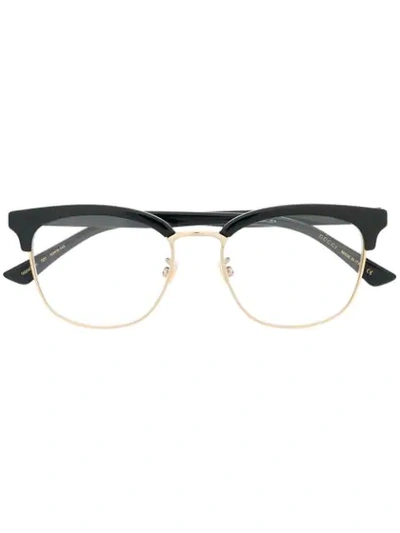 Shop Gucci Oval Frame Glasses In Black