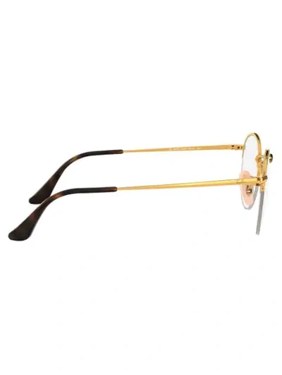 Shop Ray Ban Round Frame Glasses In Gold