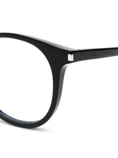 Shop Saint Laurent Round Frame Glasses In Black