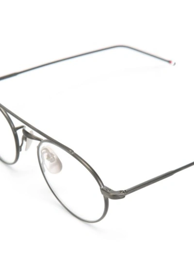 Shop Thom Browne Eyewear Round Frame Glasses - Metallic