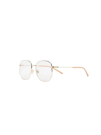 Shop Gucci Rectangular Frame Glasses In Metallic