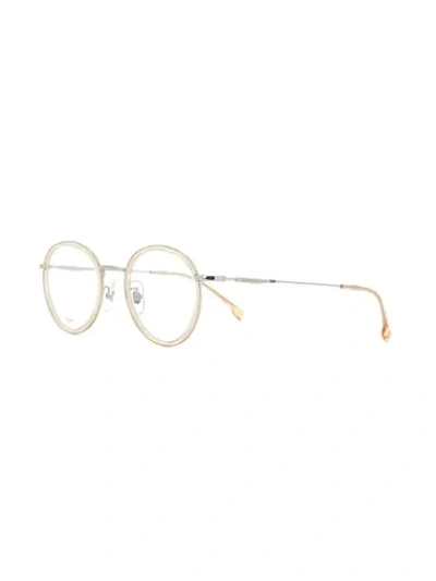 Shop Carrera Round Frame Glasses In Metallic