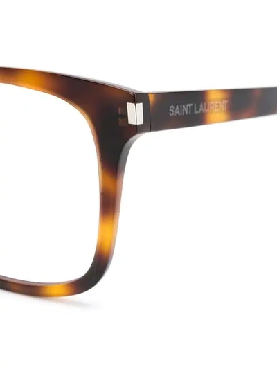 Shop Saint Laurent Tortoiseshell Glasses In Brown