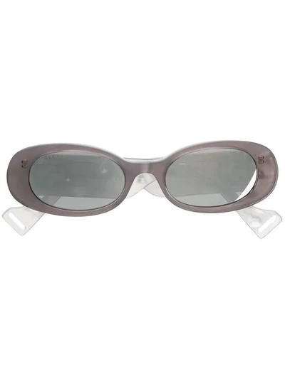 Shop Gucci Oval Frame Sunglasses In Grey