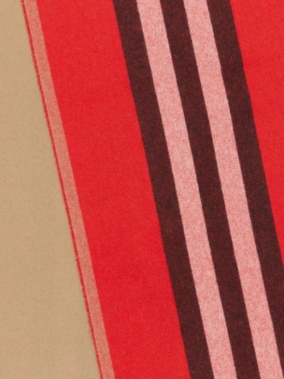 Shop Burberry Reversible Icon Stripe Cashmere Scarf In Red