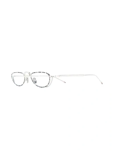 Shop Thom Browne Tortoiseshell Effect Oval Glasses In 银色