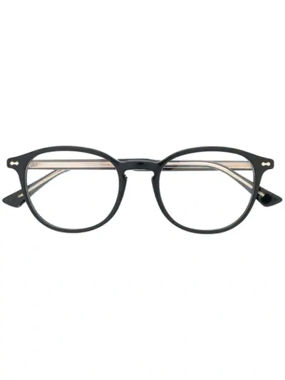 Shop Gucci Oval Frame Glasses In Black